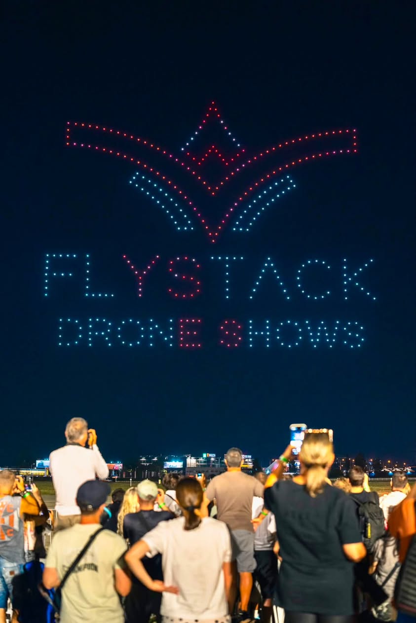 The FLYSTACK Drone Shows logo drawn with drones against the night sky at the end of the BIAS 2026 show